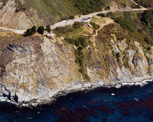 Aerial view of Lucia Lodge perched on the Big Sur cliffs above the Pacific Ocean