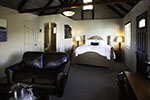 Mountain view room with window seating at Lucia Lodge