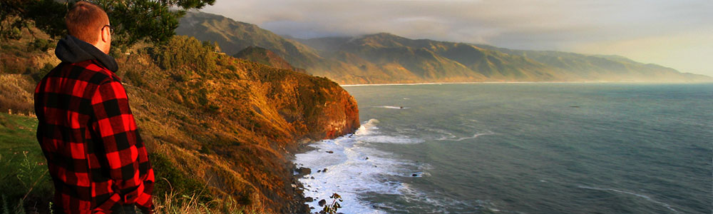 Ocean view from a bed at Lucia Lodge, looking out over the cliffs and Pacific Ocean